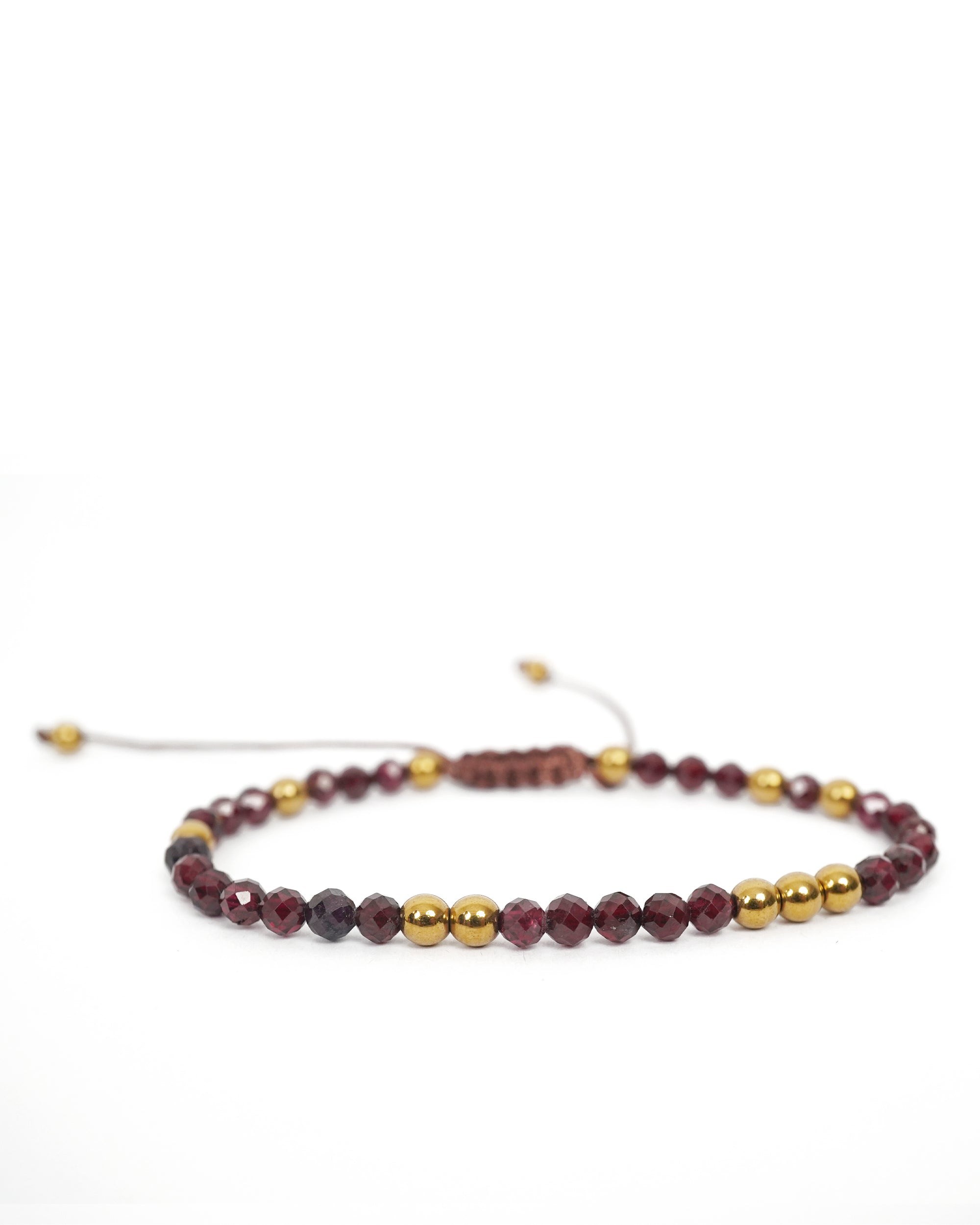 Cadence Pulse Bracelet in Faceted Red Garnet